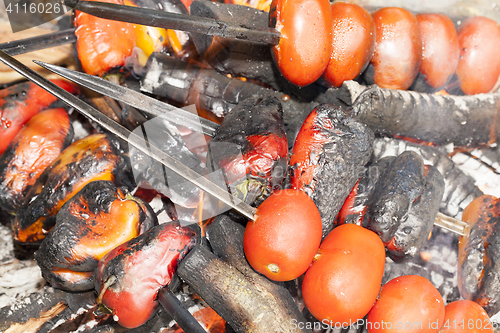 Image of fried vegetables on a fire