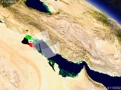 Image of Kuwait with embedded flag on Earth