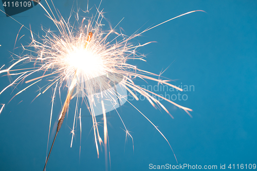 Image of Bengal light on blue background