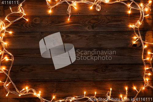 Image of Christmas garland on dark background