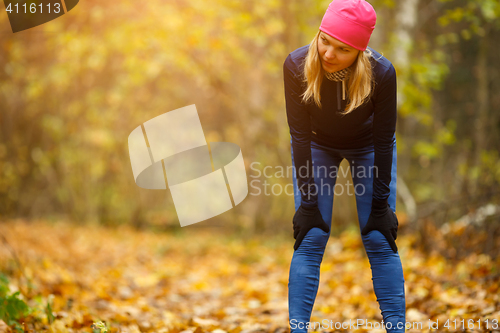 Image of Sportswoman in hat at park