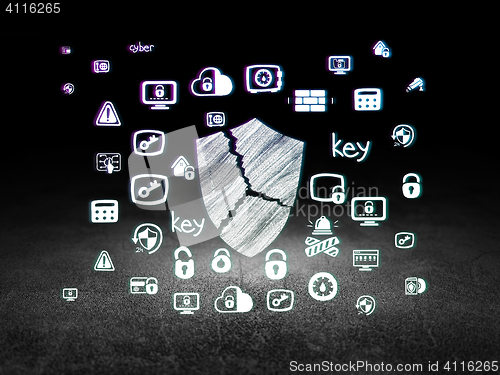 Image of Safety concept: Broken Shield in grunge dark room