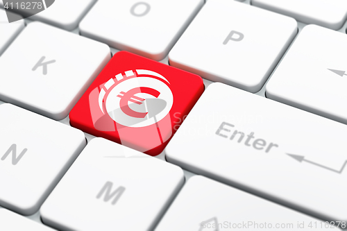 Image of Banking concept: Euro Coin on computer keyboard background