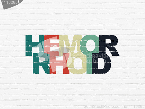 Image of Medicine concept: Hemorrhoid on wall background
