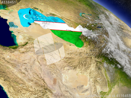 Image of Uzbekistan with embedded flag on Earth