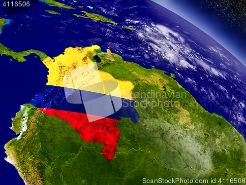 Image of Colombia with embedded flag on Earth