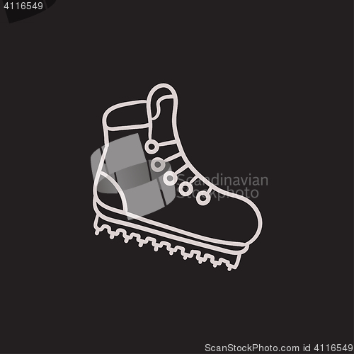 Image of Hiking boot with crampons sketch icon.