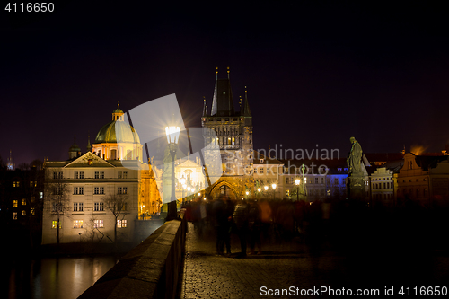 Image of Night photo of Prague Charles Bridge and powder tower