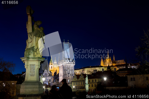 Image of Night photo of Prague Charles Bridge and powder tower