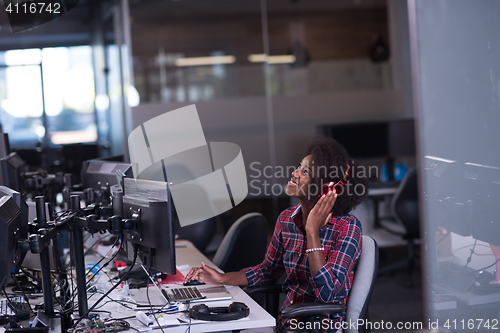 Image of portrait of a young successful African-American woman in modern 