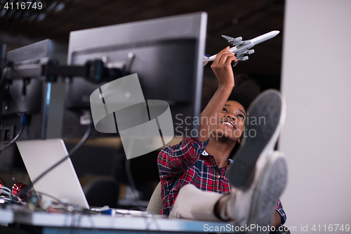 Image of portrait of a young successful African-American woman in modern 