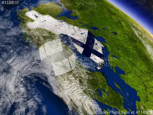 Image of Finland with embedded flag on Earth