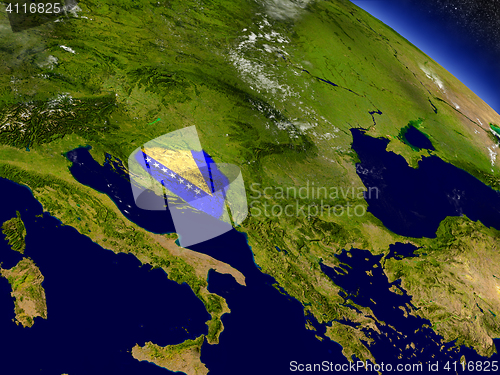 Image of Bosnia with embedded flag on Earth