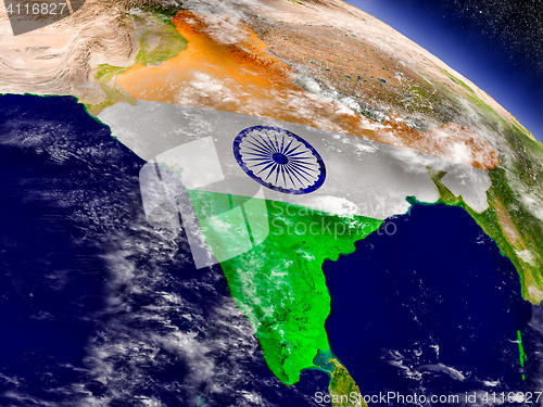 Image of India with embedded flag on Earth