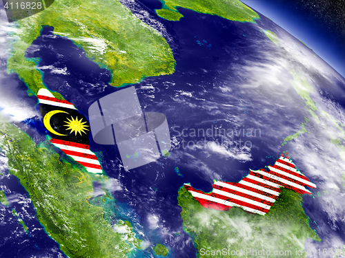 Image of Malaysia with embedded flag on Earth