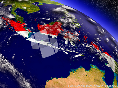 Image of Indonesia with embedded flag on Earth