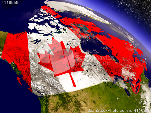 Image of Canada with embedded flag on Earth