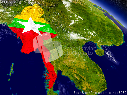 Image of Myanmar with embedded flag on Earth