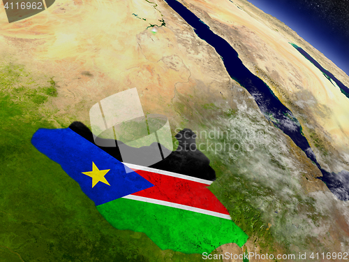 Image of South Sudan with embedded flag on Earth