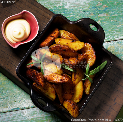 Image of Potato Wedges and Cheese Sauce