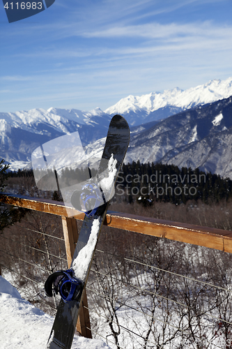 Image of Snowboards in outdoor cafe at ski resort