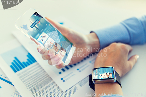 Image of close up of woman with news web page on smartphone