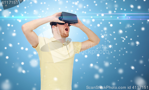 Image of happy man in virtual reality headset or 3d glasses