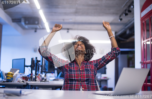 Image of portrait of a young successful African-American woman in modern 