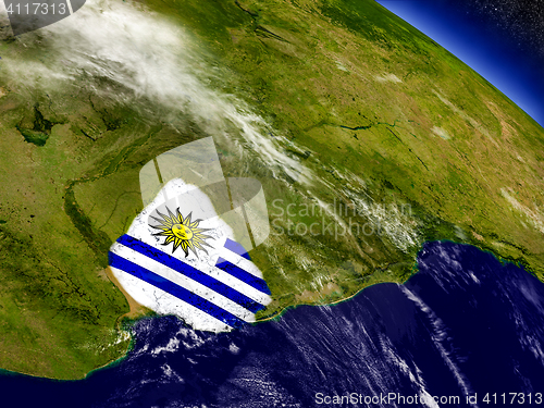 Image of Uruguay with embedded flag on Earth