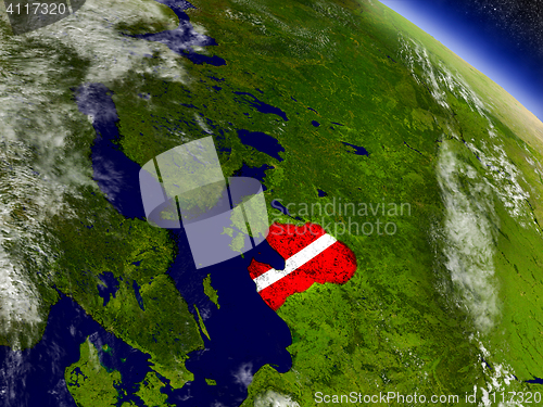 Image of Latvia with embedded flag on Earth