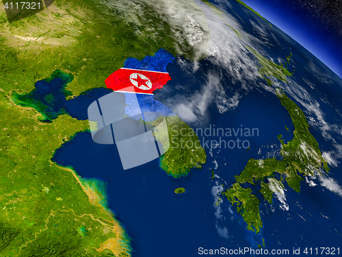 Image of North Korea with embedded flag on Earth