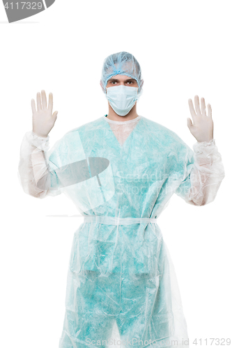 Image of Surgeon portrait. hands raised up. isolated on white background