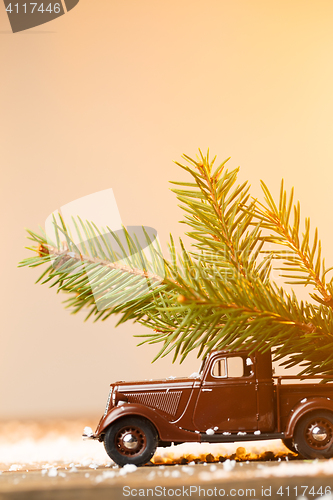 Image of Toy car driven branch fir