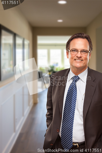 Image of Businessman In Hallway of New House