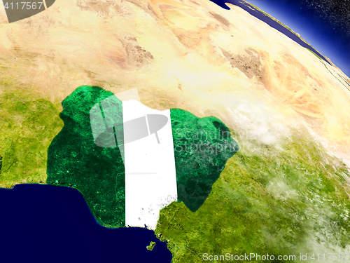 Image of Nigeria with embedded flag on Earth
