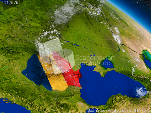 Image of Romania with embedded flag on Earth