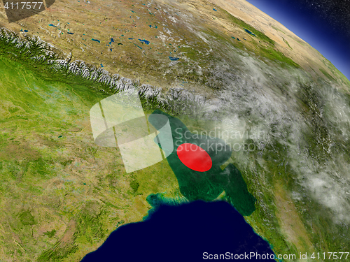 Image of Bangladesh with embedded flag on Earth