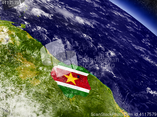 Image of Suriname with embedded flag on Earth