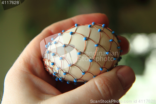Image of Easter eggs decorated with wire
