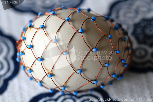 Image of Easter eggs decorated with wire