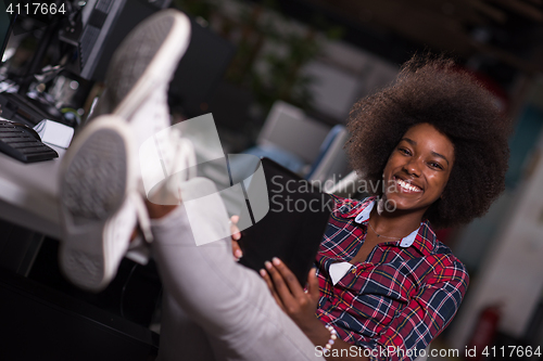 Image of young black woman at her workplace in modern office  African-Ame