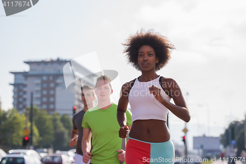 Image of multiethnic group of people on the jogging