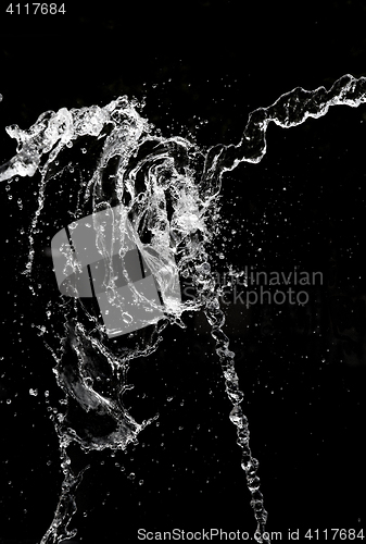 Image of Water splash over black background