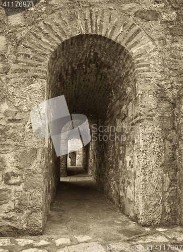 Image of Old archway in sepia tone