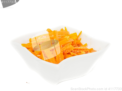 Image of Closeup of carrot cut into julienne slices in a beautiful white 