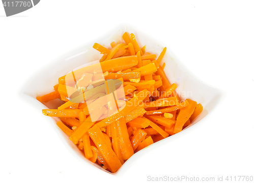 Image of Closeup of carrot cut into julienne slices in a beautiful white 