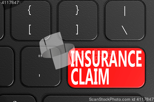 Image of Insurance Claim on black keyboard