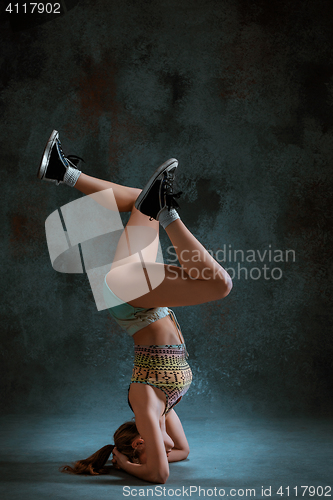 Image of Attractive girl dancing twerk in the studio