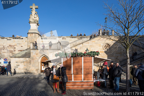 Image of Christmas market under famous Charles bridge in Prague