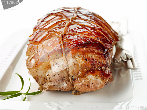 Image of roasted pork on white plate